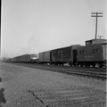1953c-HwBoro-Train-Crossing-Louellen-HwRR-REL-05-Train-Caboose-east