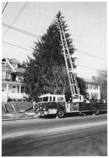 Broad West-010-19xx-ph-Fire Dept Xmas Tree-HPL Fire1986